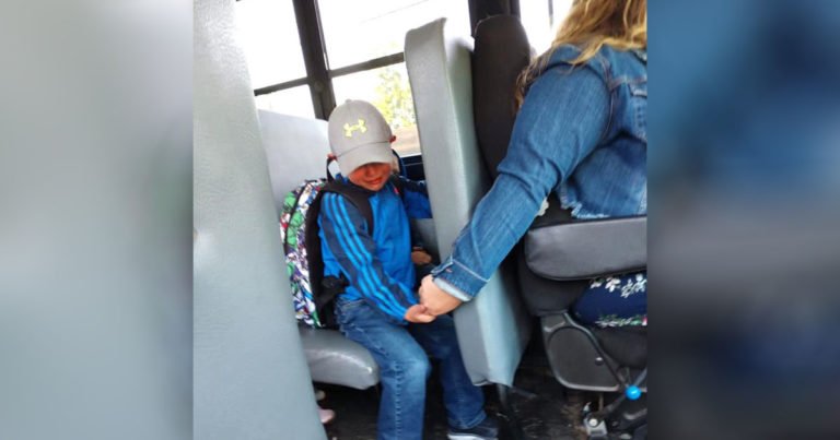 bus-driver-comforts-boy-first-day-school