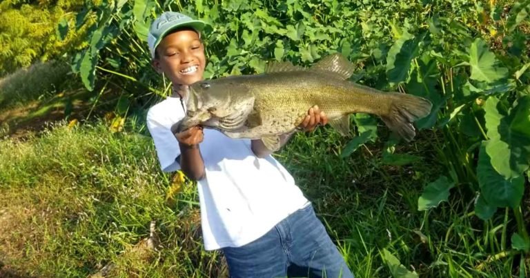 boy-catches-first-fish-main