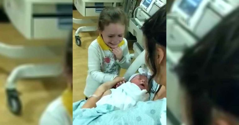 girl-cries-meeting-newborn-sister