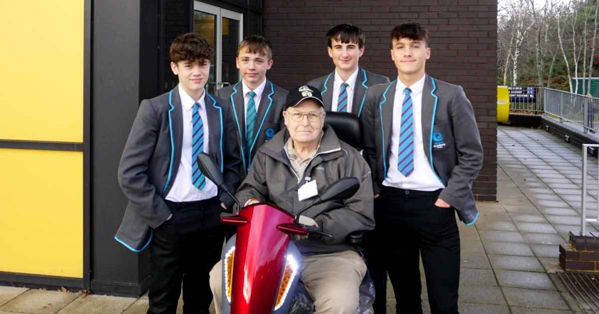 teenagers-push-elderly-man-mobility-scooter
