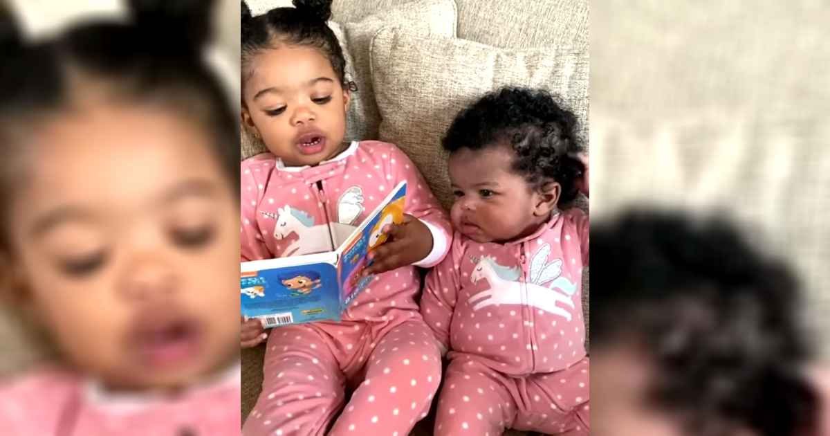 girl-reads-to-little-sister