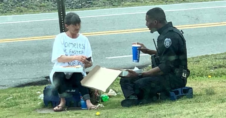 officer-feeds-homeless-woman