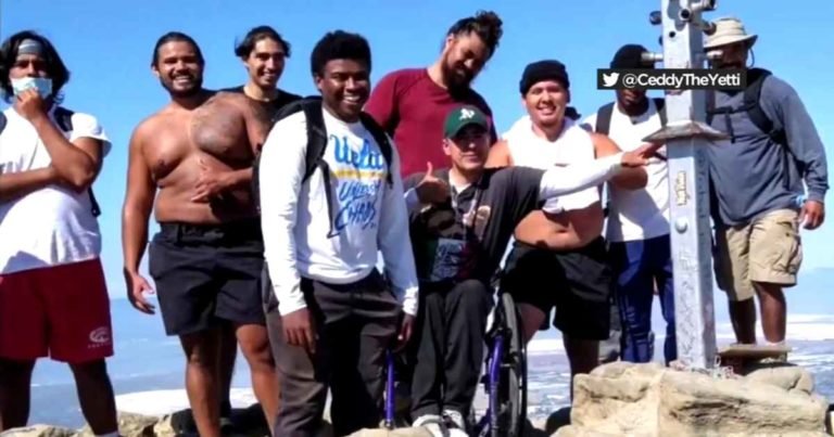 football-team-carries-man-in-wheelchair-to-fremont's-mission-peak