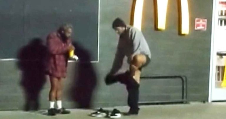 man-gives-pants-to-homeless-man