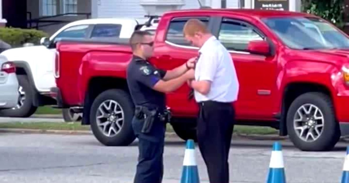 cop-helps-teen-with-tie