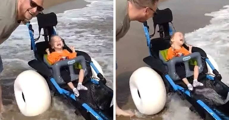 disabled-boy-playing-in-ocean