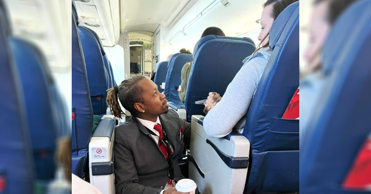 flight-attendant-comforting-nervous-passenger