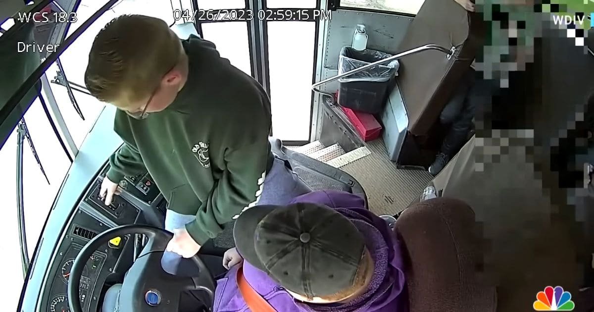 boy stops school bus michigan