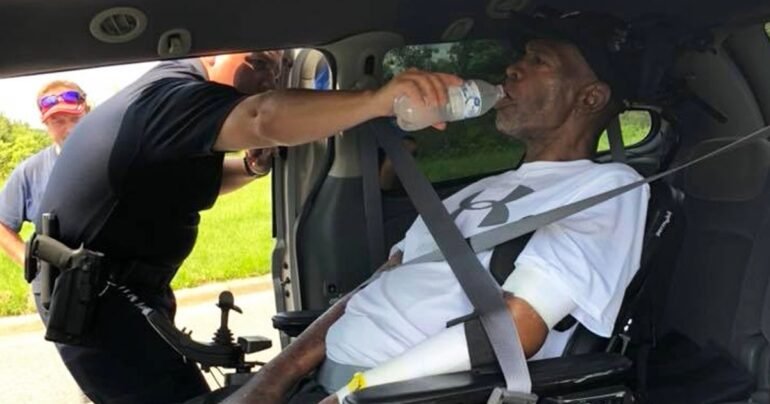 kind officer gives man water