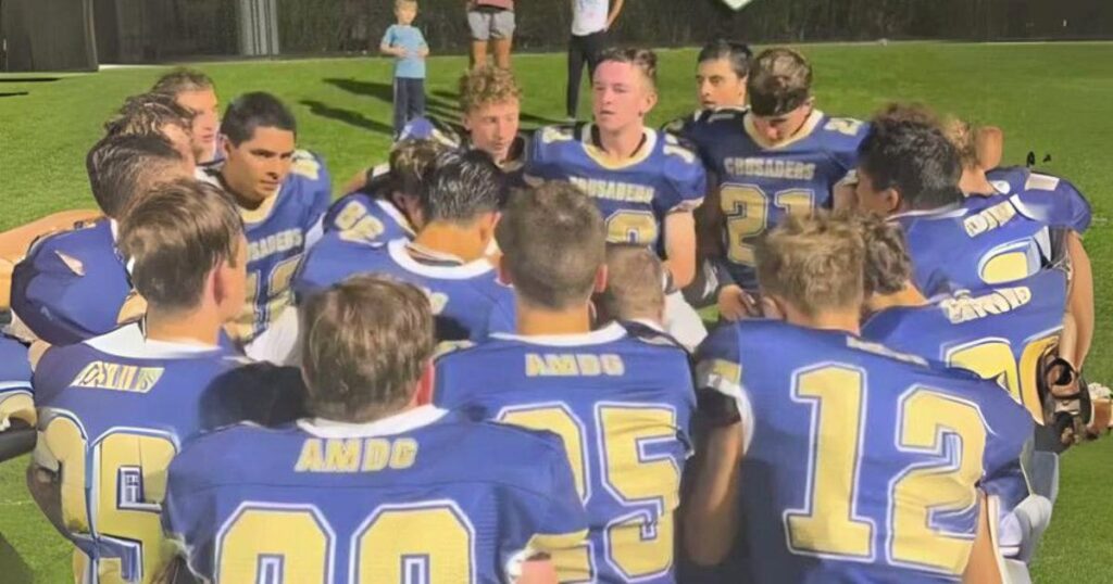 high-school-football-team-kneels-after-every-game-to-sing-ave-maria