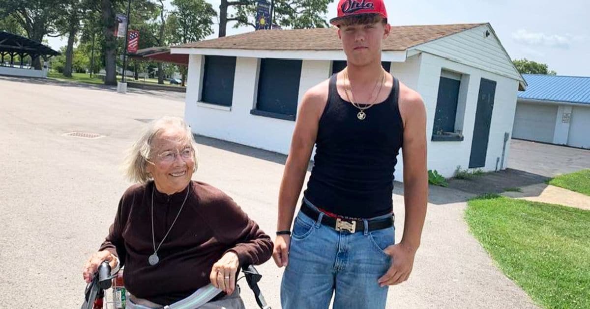 teen helps elderly woman after fall