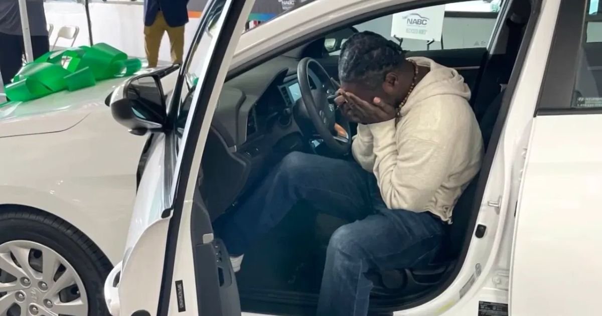man surprised with car